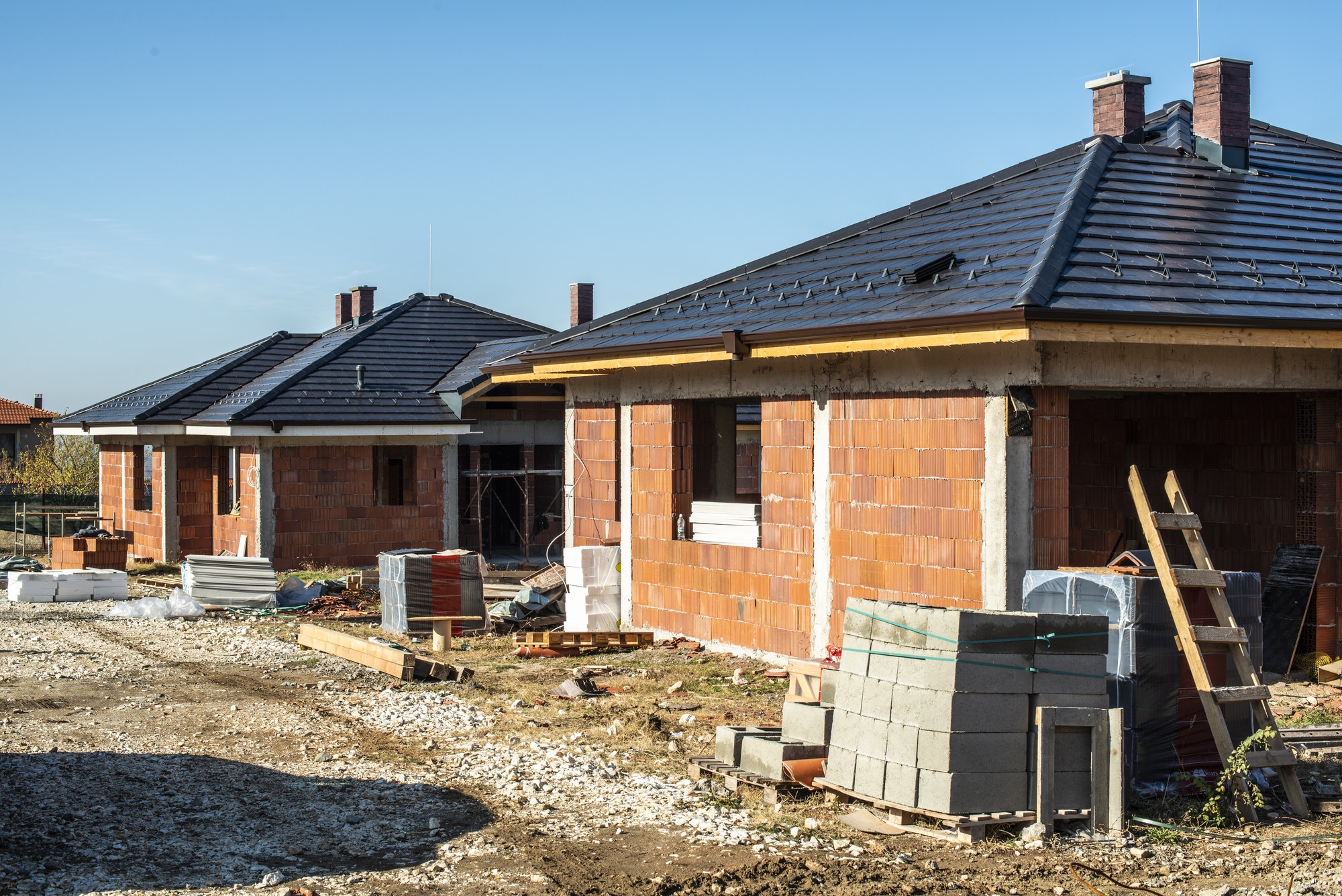 Building a New Brick House with black roof in Sydney